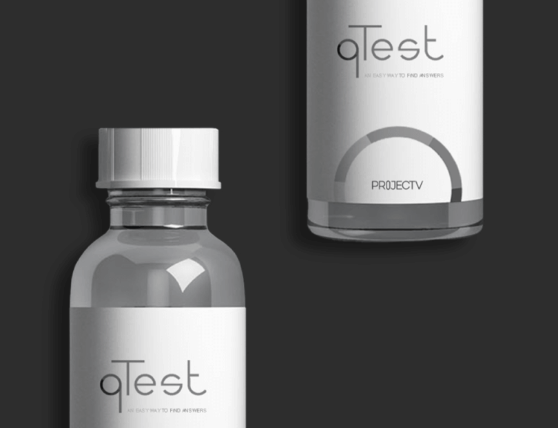 white bottles with qtest logo on the grey background